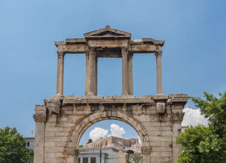 Acropolis hill with the Hadrians Arch in frontの写真素材