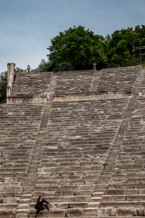 EPIDAURUS, GREECE - 15 MAY 2019: Tourists in theater of the Sanctuary of Asklepios at Epidaurusのeditorial素材