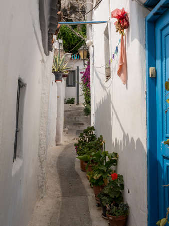 Narrow steps in ancient neighborhood of Anafiotika in Athens by the Acropolisの写真素材