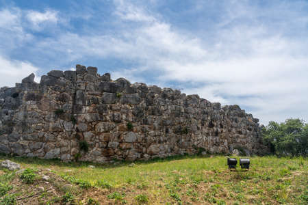 Massive boulders form the walls of the fortress and palace of Tiryns in Greeceの写真素材