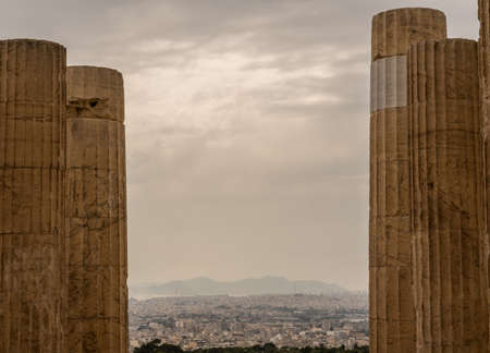 Columns on Acropolis frame the city of Athens surrounding itの写真素材
