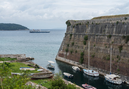 CORFU, GREECE - 20 MAY 2019: Walls and moat around Old Fortress in the town of Corfuのeditorial素材