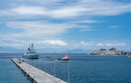 CORFU, GREECE - 20 MAY 2019: HMS Duncan Royal Navy destroyer leaving harbour in Corfuのeditorial素材
