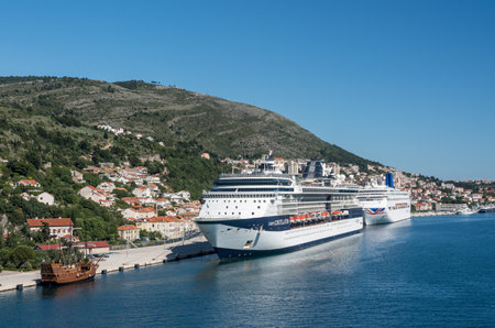 Dubrovnik, Croatia - 22 May 2019: Celebrity Constellation cruise ship with P and O Oriana docked in the Dubrovnik cruise port near the old townのeditorial素材