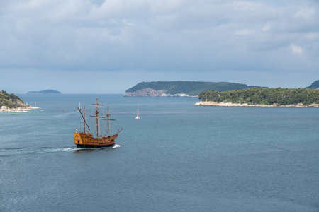 Dubrovnik, Croatia - 22 May 2019: Pirate type cruise boat leaving the Dubrovnik cruise port on tour to the old townのeditorial素材