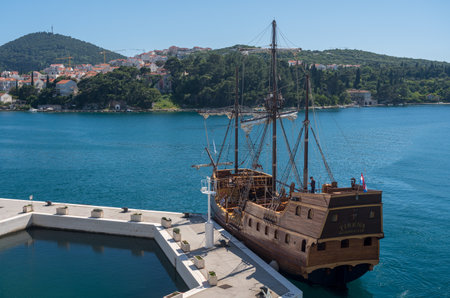 Dubrovnik, Croatia - 22 May 2019: Pirate type cruise boat arriving at the Dubrovnik cruise port after tour to the old townのeditorial素材