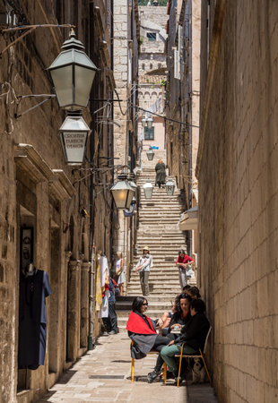Dubrovnik, Croatia - 22 May 2019: Steep steps with tourists and local people in the old town of Dubrovnik in Croatiaのeditorial素材