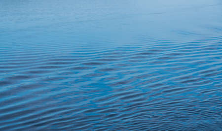 Ripples in the calm Adriatic sea off the coast of Croatia as ship approaches port of Zadar