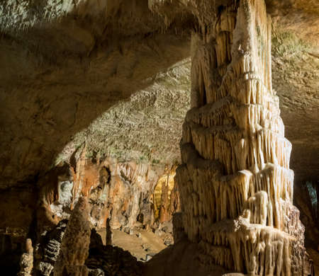 Stalactites and stalagmites underground in cave system in Postojnaの写真素材