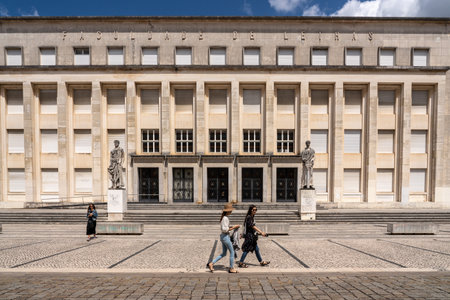 Coimbra, Portugal - 11 August 2019: Tourists outside a modern building at the University of Coimbraのeditorial素材