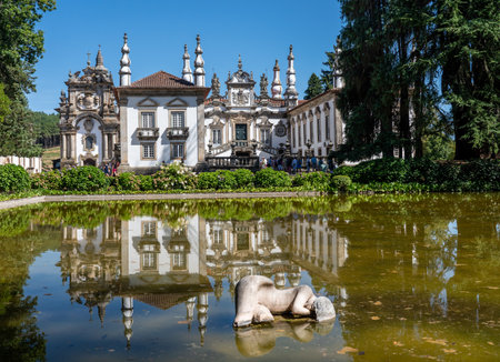 Vila Real, Portugal - 13 August 2019: Woman Sleeping statue in front of entrance of Mateus Palace in Vila Real, Portugalのeditorial素材