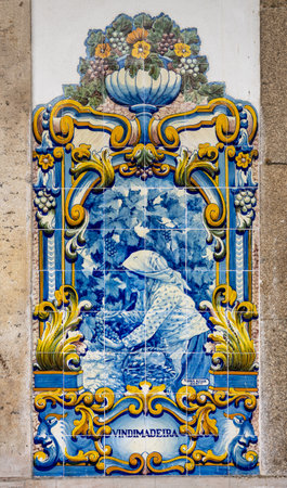 Pinhao, Portugal - 13 August 2019: Glazed tiles by J. Oliveira, depicting the Douro region and Port wine making activities.のeditorial素材