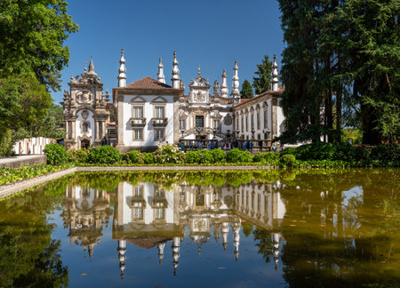 Vila Real, Portugal - 13 August 2019: Reflection of villa in front of entrance of Mateus Palace in Vila Real, Portugalのeditorial素材