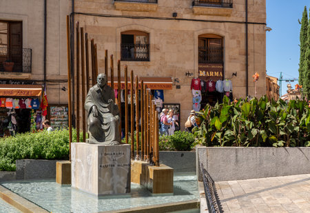Salamanca, Spain - 15 August 2019: Statue and fountain to Maestro Salinas by the University of Salamancaのeditorial素材