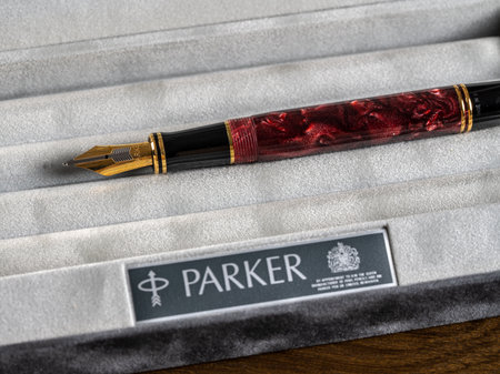 Morgantown, WV - 20 November 2019: Box holding an expensive Parker Duofold gold fountain pen in maroonのeditorial素材