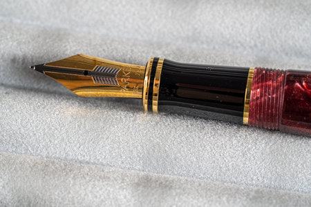 Morgantown, WV - 20 November 2019: Box holding an expensive Parker Duofold gold fountain pen in maroonのeditorial素材