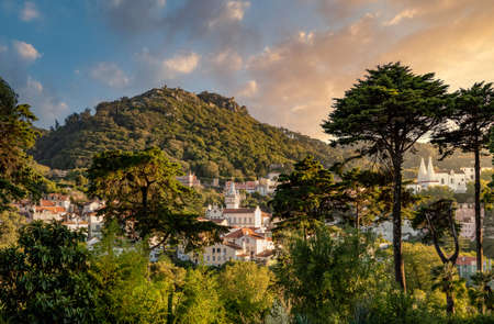 Sunset view of the Portuguese town of Sintra with the Moorish fortress on the hilltop above the cityの写真素材