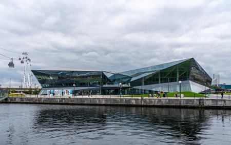 London, UK - 5 October 2019: Royal Dock in East London with the Crystal building and cable car line