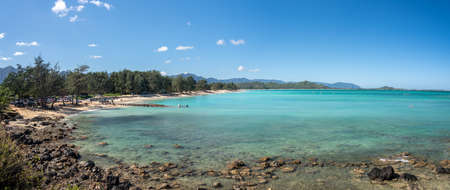 Panorama of the wide sandy Kailua Beach with mountains in background on east coast of Oahu in Hawaiiの写真素材