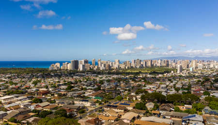 Aerial drone view of suburbs of Kaimuki and Waikiki with Honolulu in the backgroundの写真素材