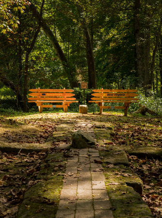 Morgantown, WV - 20 August 2020: Benches mark the border in Mason Dixon Historical Park between West Virginia and Pennsylvaniaのeditorial素材