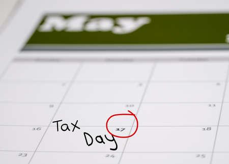 Tax Day concept for May 17 2021 using calendar and note