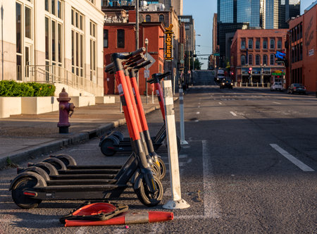 Nashville, Tennessee - 28 June 2021: Spin electric scooter on roadside near Broadway and downtown entertainmentのeditorial素材