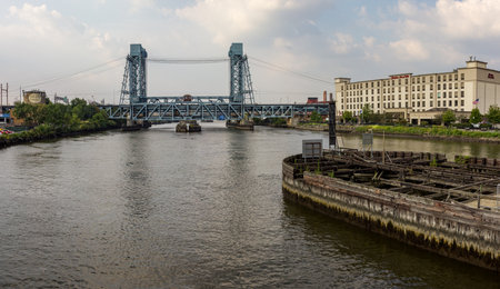 Newark, NJ - September 11, 2013: NJ Transit train line crosses the Newark Drawbridge over the Passaic River in New Jerseyのeditorial素材
