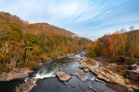 Valley Falls State Park near Fairmont in West Virginia on a colorful misty autumn day with fall...