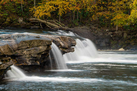 Valley Falls State Park near Fairmont in West Virginia on a colorful misty autumn day with fall colors on the treesの写真素材