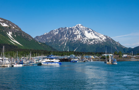 Seward, Alaska - 3 June 2022: Small boats in the port of Seward in Alaskaのeditorial素材