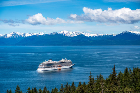 Hoonah, AK - 7 June 2022: Viking Orion cruise ship anchored at Icy Strait Point Alaska with...