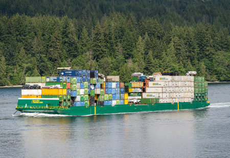 Campbell River, BC - 11 June 2022: Containers stacked on Alaska Marine Lines barge in Discovery Passageのeditorial素材