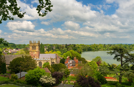 Tower of parish church of St Mary in Ellesmere Shropshire from the Motteの写真素材