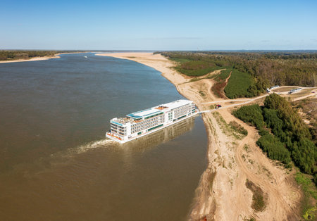 Vicksburg, MO - 25 October 2023: Viking Mississippi river boat docked on sand bank due to low water levels in the river at Vicksburgのeditorial素材