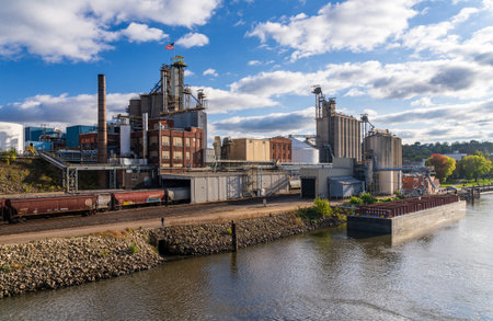 Red Wing, MN - 15 October 2023: ADM food processing and storage plant in the town in Minnesota seen from Mississippi riverのeditorial素材