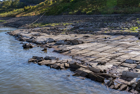 Damaged concrete revetment mats exposed by extreme low water conditions on Mississippi river in October 2023の写真素材