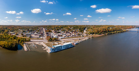 Hannibal, MO - 20 October 2023: Aerial view of the city of Hannibal in Missouri with the Viking Mississippi river cruise boat docked on riverbankのeditorial素材