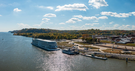 Hannibal, MO - 20 October 2023: Aerial view of the city of Hannibal in Missouri with the Viking Mississippi river cruise boat docked on riverbankのeditorial素材