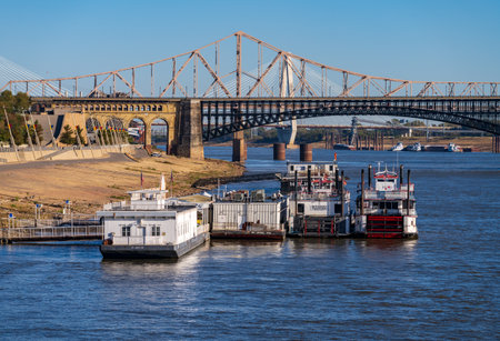 St Louis, MO - 21 October 2023: Low water levels in Mississippi river with casino riverboats docked by riverbankのeditorial素材