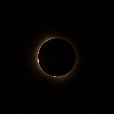 HD image of the solar eclipse in 2024 with the moon finally covering the sun. Bailys beads of light...
