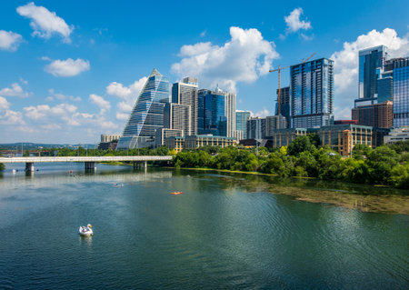 Modern apartment buildings and offices by the Colorado River in cityscape skyline of Austin Texas