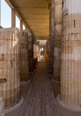 Series of large stone columns in the entrance court to the Stepped Pyramid of Djoser in Egyptの写真素材