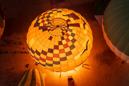 Inflating hot-air balloons for flight over Sahara desert and Valley of Kings near Luxor, Egpytの写真素材
