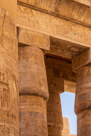 Detail of the carvings on the numerous stone columns supporting roof of Karnak Temple near Luxorの写真素材