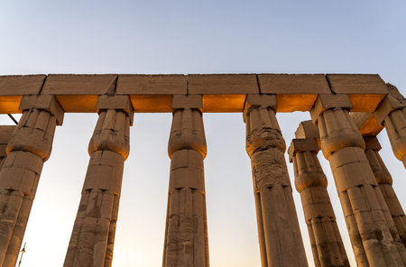 Massive numerous stone columns supporting roof of Luxor Temple in Egyptの写真素材