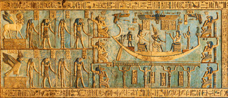 Carvings on the ceiling with restored painting in the temple of Hathor at Dendera in Egyptの写真素材