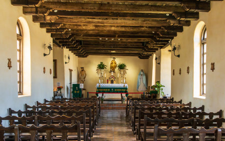 Interior of historic Espada mission church near San Antonio, Texas, with simple design and decorationsの写真素材