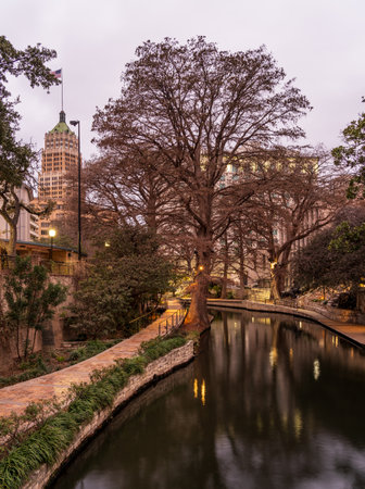Empty walkways at dawn in long exposure image of River Walk in San Antonio, Texasの写真素材