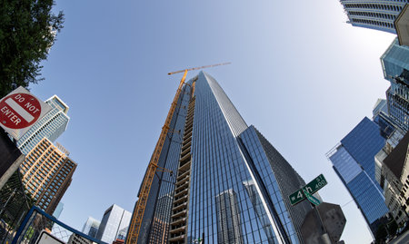 From below fisheye lens view of The Republic building in downtown Austin Texas in springの写真素材